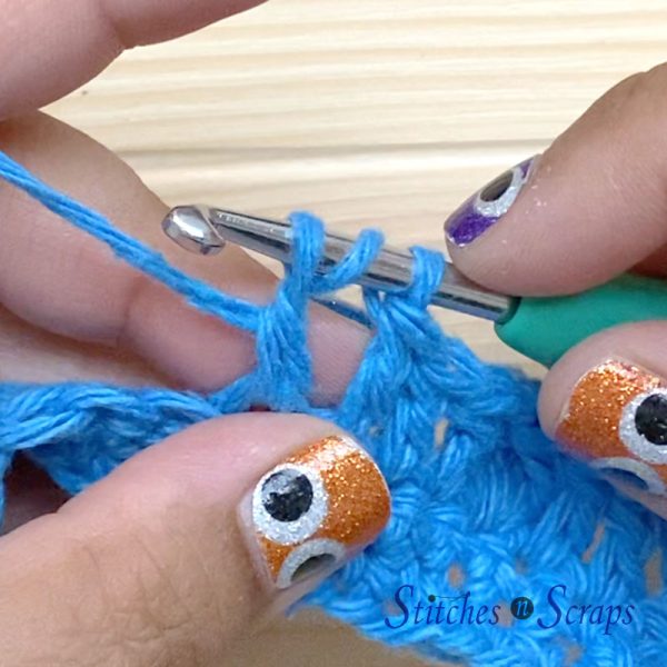 A treble crochet worked through the first step only