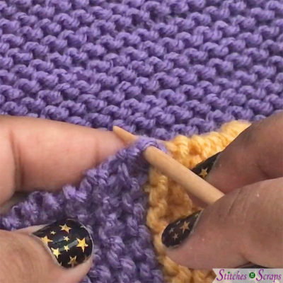 insert needle for first stitch - Pick up and Knit tutorial on StitchesnScraps.com