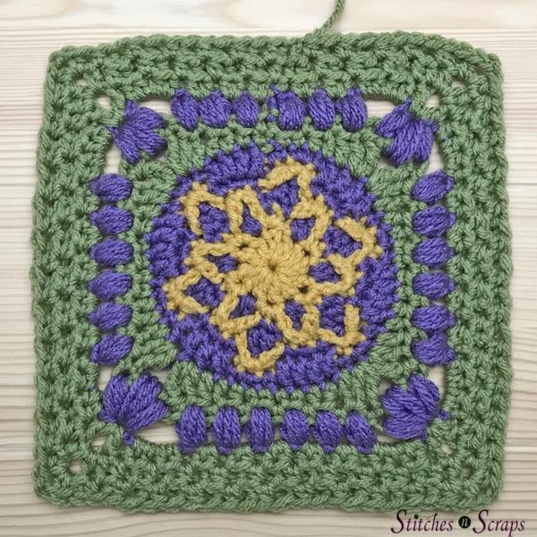 Yellow, purple, and green crochet afghan block - Rnd 13 of Supernova Square on Stitches n Scraps