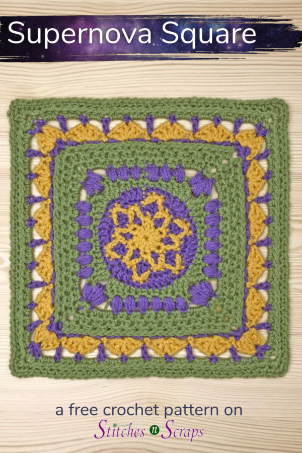 Crocheted Supernova afghan block on a wood table. Wording says Supernova Square a free crochet pattern on Stitches n Scraps