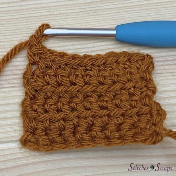A crochet swatch showing stitches worked into the front loop, in rows.