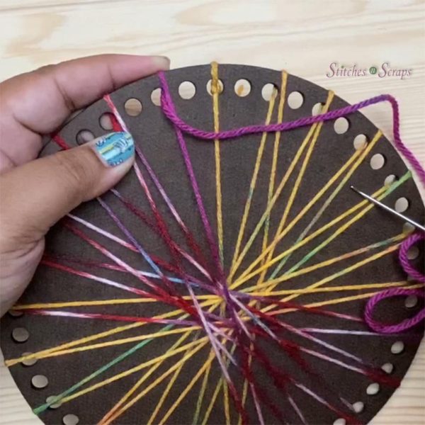 Warping a round basket base for use as a loom