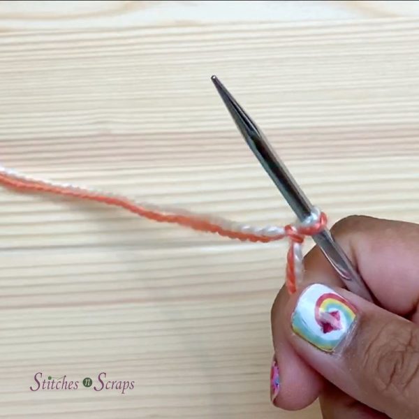 Slip knot with 2 different color yarns held together