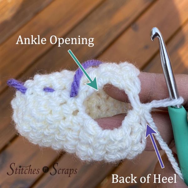 Foot of superhero doll, showing ankle opening and back of heel
