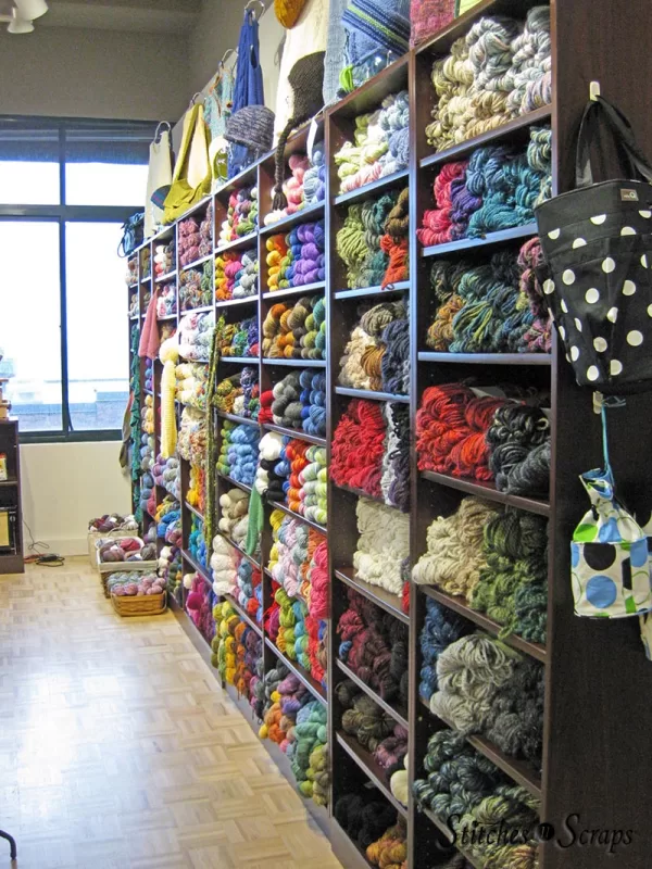 A shelf full of yarn at So Much Yarn