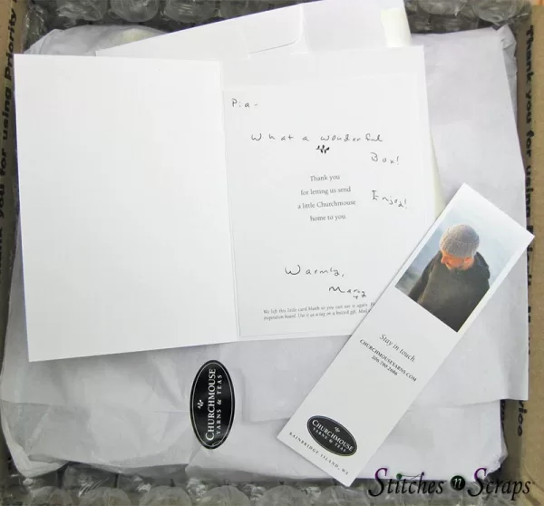 Opening my package, with a thank you card and bookmark on top