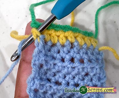 draw up blue yarn 
