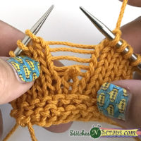 drop down 4 rows - Bubble Stitch washcloth on StitchesNScraps.com