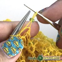 pull stitch through bead - Knitting with Beads Tutorial on Stitches 'N' Scraps