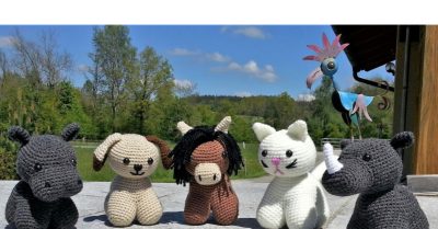 Crocheted stuffed animals - hippo, dog, horse, cat, rhino. Text: Scrappy Stitchers Link Party 57 - Most Clicked Last Month: Nashorn (Rhino) from Häkelffieber