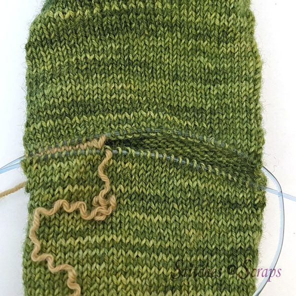 Removing the waste yarn from the heel