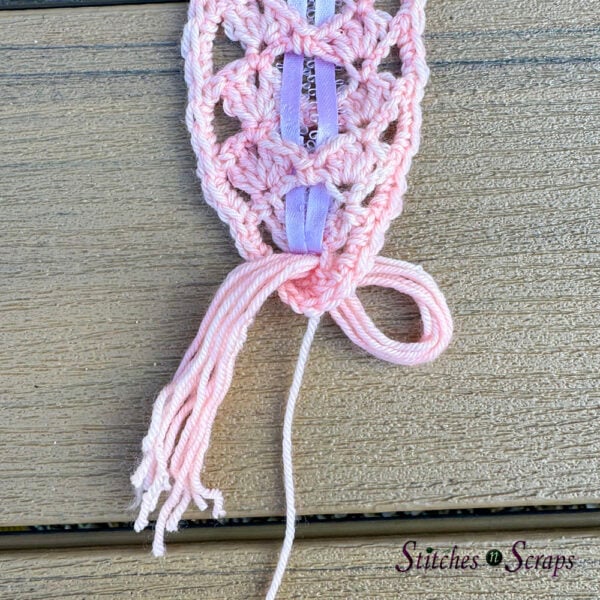 Pull tassel loop through to WS