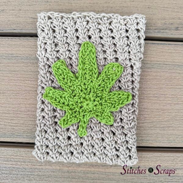 pouch with leaf applique attached