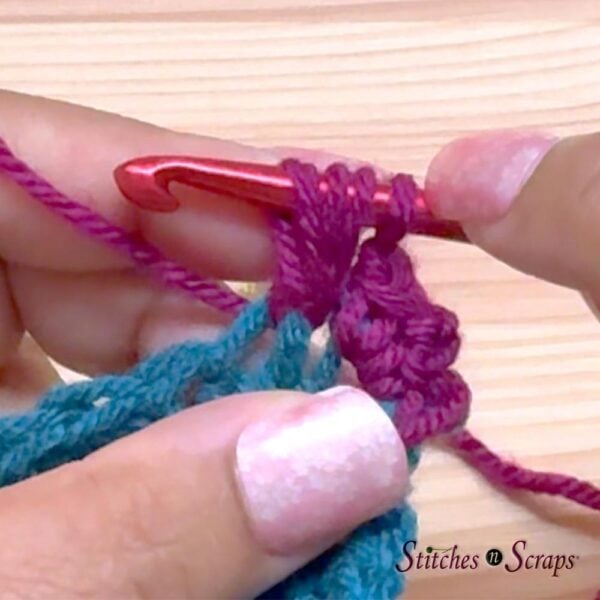 Crossed cluster stitch