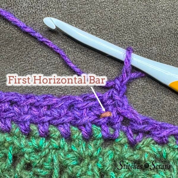 First horizontal bar of left front band